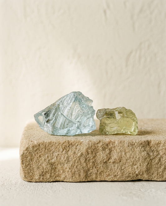 Raw Aquamarine and Heliodor specimen on stone base