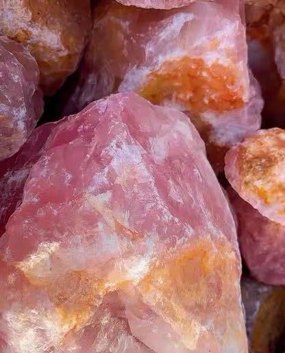 Collection of unhewn Madagascar rose quartz raw chunks with earthy iron-stained crusts, natural pink healing crystal blind box parcel by STILLMANTLE