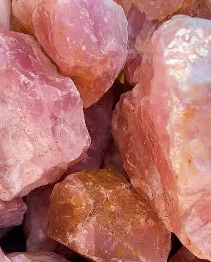 Close-up of raw pink rose quartz mineral specimen showing rugged natural crust and gemmy interior, wabi-sabi earth art and grounding stone decor by STILLMANTLE⁠