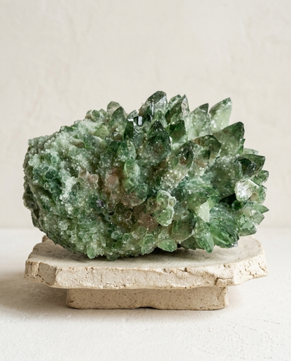 Side view of raw green chlorite and red hematoid phantom quartz on a natural stone base, healing earth tones mineral specimen, minimalist quiet luxury home decor by STILLMANTLE⁠